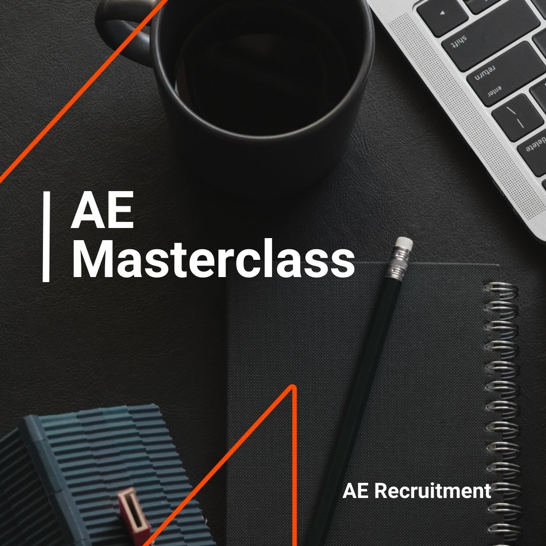 Flat lay with a black coffee, laptop keyboard, notebook, and pencil. White text reads “AE Masterclass” with AE Recruitment branding.